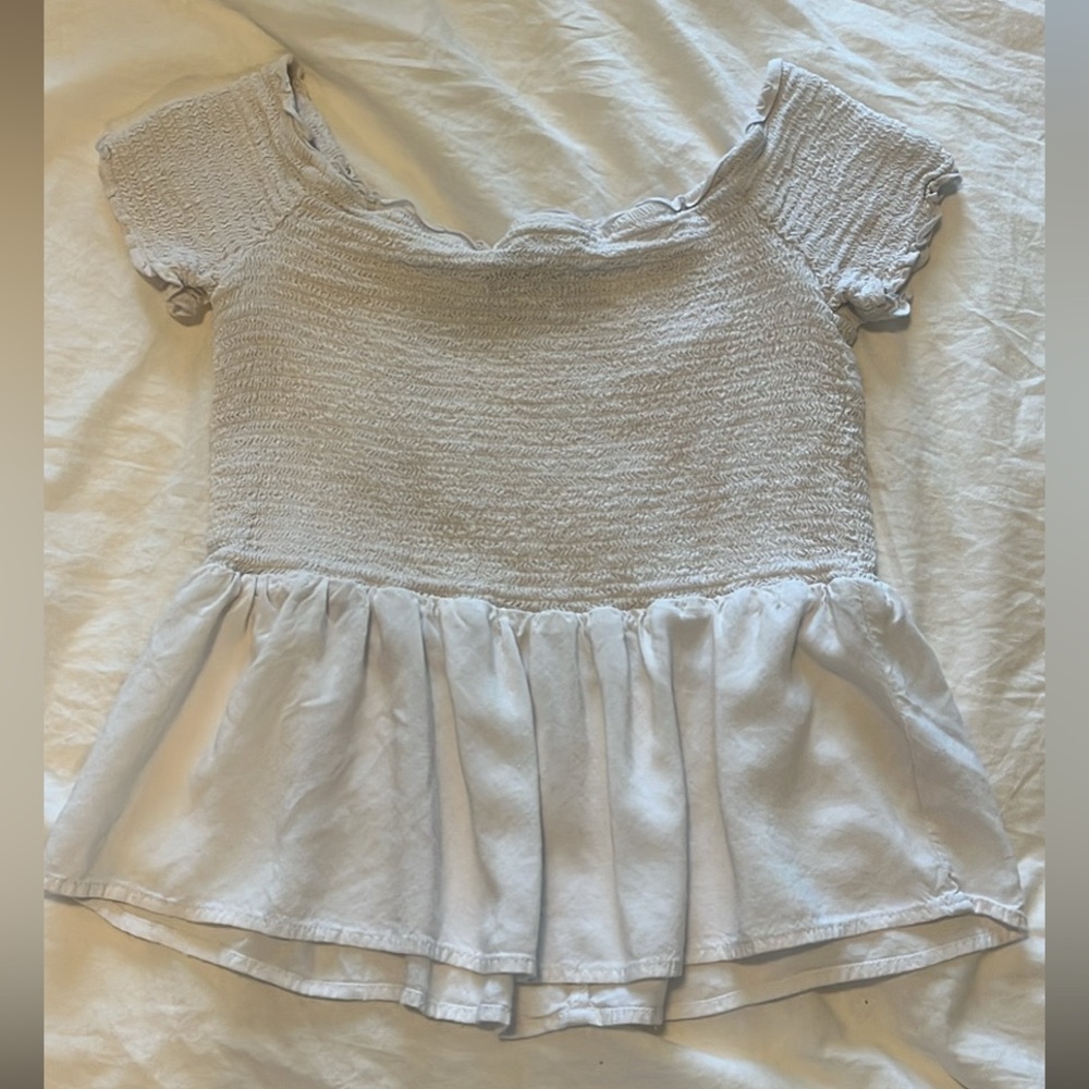 Francesca’s white off the shoulder top